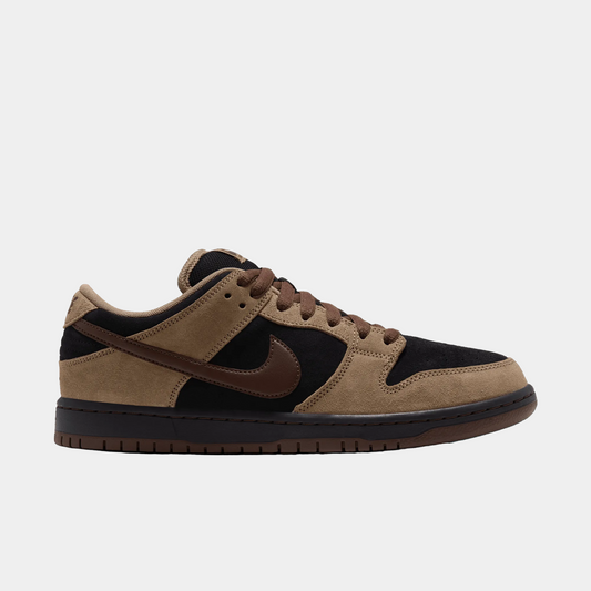 A Nike Dunk sneaker in a brown and black colorway, featuring a tan suede upper, black overlays, a dark brown Swoosh, and a black and brown sole, shown in a side profile on a white background.