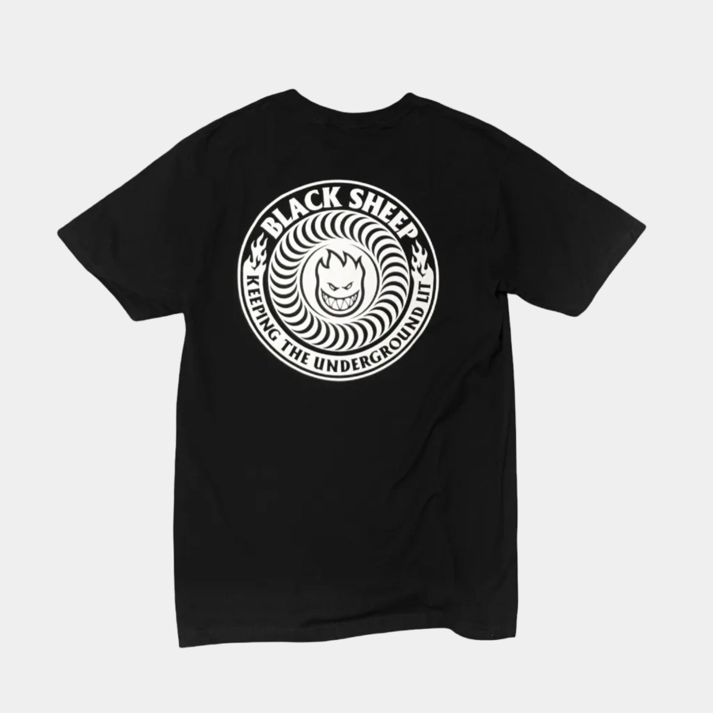 A black short-sleeve t-shirt with a circular white graphic on the chest featuring the text 'BLACK SHEEP' and 'LETTING THE UNDERGONE IN' around a stylized face, displayed on a solid white background.