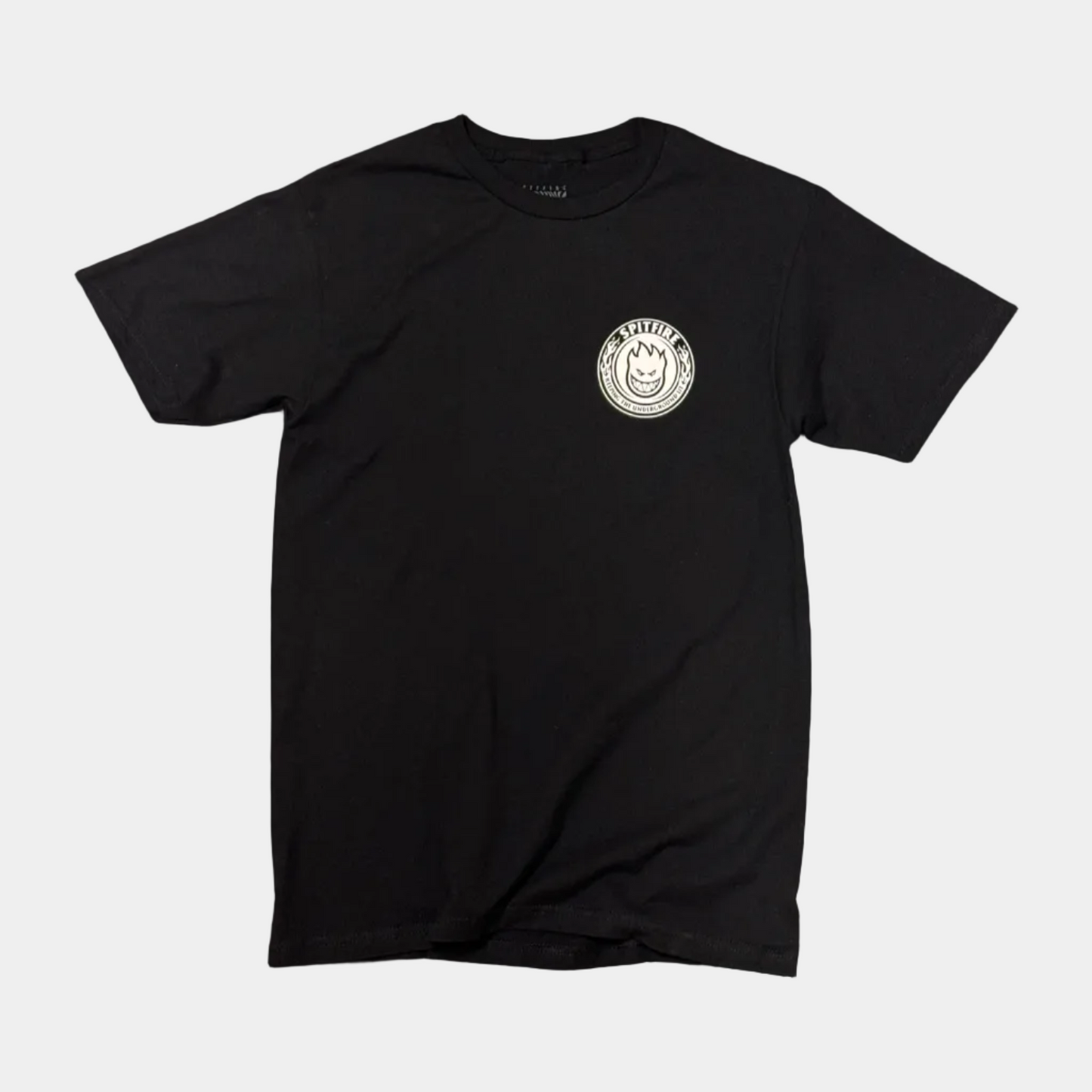 A black short-sleeve crewneck t-shirt with a circular white graphic printed on the left chest, displayed flat against a solid white background.