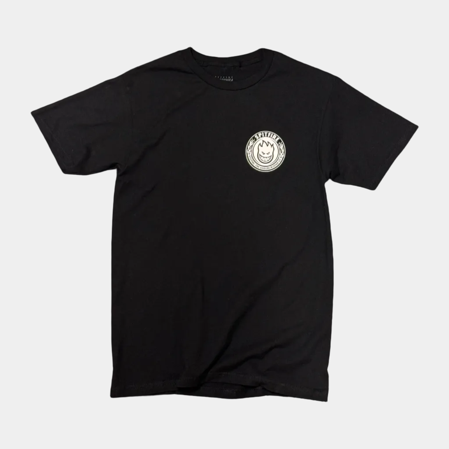 A black short-sleeve crewneck t-shirt with a circular white graphic printed on the left chest, displayed flat against a solid white background.