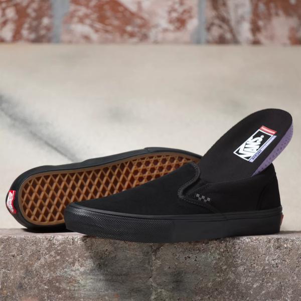 Vans slip on triple black sale