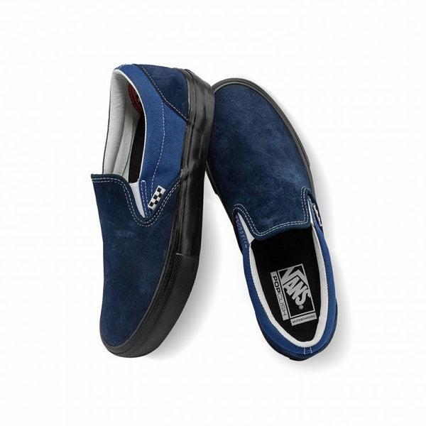 Blue and black slip on vans on sale